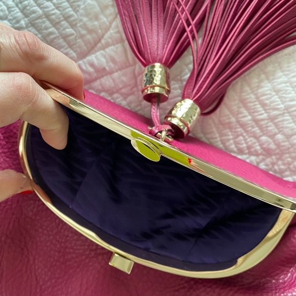 Tumi pink leather clutch w/purple lining and tassels - Picture 3 of 7